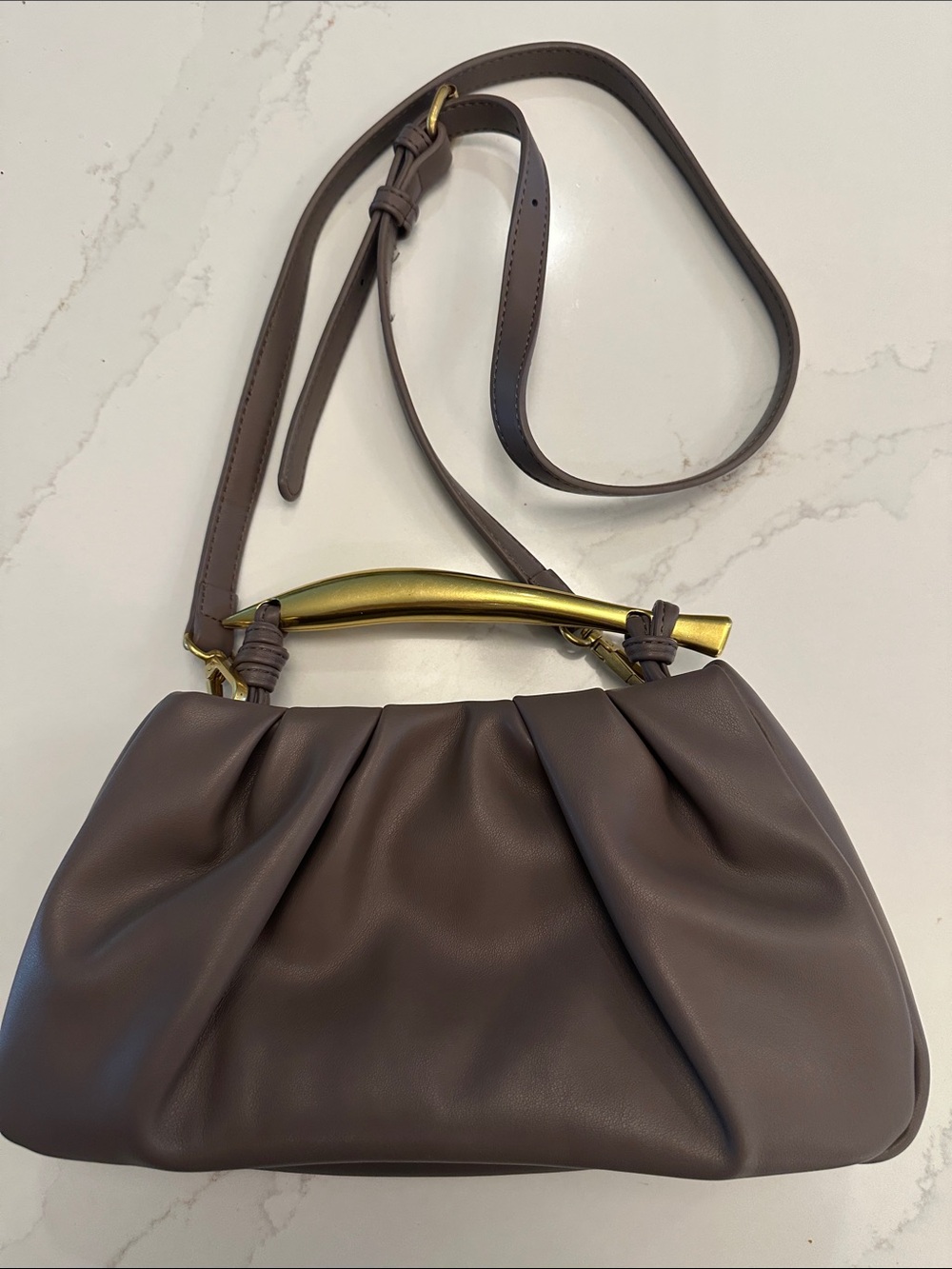Anthropologie Elegant Women's Shoulder Bag in Taupe with Gold handle.